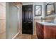 Bathroom featuring a modern sink, new shower, and gorgeous tile work at 18472 E Atlantic Dr, Aurora, CO 80013
