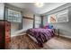 Inviting bedroom with hardwood floors, soft natural light, and a comfortable atmosphere at 18472 E Atlantic Dr, Aurora, CO 80013