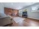 Cozy living room with fireplace, hardwood floors and plenty of natural light at 18472 E Atlantic Dr, Aurora, CO 80013