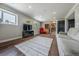 Spacious living room features hardwood floors and plenty of room for seating and entertaining at 18472 E Atlantic Dr, Aurora, CO 80013