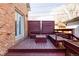 Charming back deck with custom wood seating and privacy screen, great for outdoor entertaining at 2931 W 20Th Ave, Denver, CO 80211