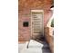 Modern front door with horizontal windows set in a red brick facade at 2931 W 20Th Ave, Denver, CO 80211