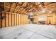 Spacious garage features high ceilings with exposed wood beams, concrete floors, and ample storage space at 2931 W 20Th Ave, Denver, CO 80211