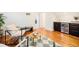 Cozy living room features a wet bar, dark cabinets, modern seating, and stylish decor at 2931 W 20Th Ave, Denver, CO 80211