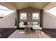 Inviting outdoor patio with comfortable seating, stylish decor, and a striped rug, perfect for relaxation and entertaining at 2931 W 20Th Ave, Denver, CO 80211