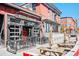Exterior of Jefferson Park Pub featuring outdoor seating, large windows, and an inviting, neighborhood feel at 2931 W 20Th Ave, Denver, CO 80211