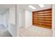 Bright basement area with large built in shelves and carpeted floor providing ample storage at 800 Mesa Ct, Broomfield, CO 80020