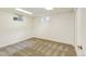 Cozy basement room with carpeted floors and light-colored walls creating a warm inviting space at 800 Mesa Ct, Broomfield, CO 80020