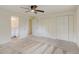 The bright bedroom offers ample closet space, neutral carpet and an ensuite bathroom at 800 Mesa Ct, Broomfield, CO 80020