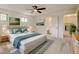 Bright bedroom features ensuite bathroom and large windows, creating a relaxing space at 800 Mesa Ct, Broomfield, CO 80020
