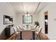 Elegant dining room featuring a modern table set and ample natural light at 800 Mesa Ct, Broomfield, CO 80020