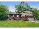Inviting two-story home with a charming front deck and well-manicured lawn at 800 Mesa Ct, Broomfield, CO 80020