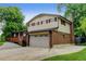 A spacious two-story home showcasing a two-car garage and brick detailing at 800 Mesa Ct, Broomfield, CO 80020