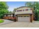 Two-story home with attached garage, deck, and brick accents at 800 Mesa Ct, Broomfield, CO 80020
