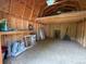 Spacious interior of a backyard storage shed with shelving and peaked ceiling at 800 Mesa Ct, Broomfield, CO 80020