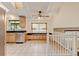 Bright eat-in kitchen features tile floor, ample cabinets, stainless appliances and a skylight at 800 Mesa Ct, Broomfield, CO 80020