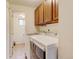 Laundry room with tile floors and washer and dryer at 800 Mesa Ct, Broomfield, CO 80020