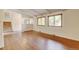 Bright living room showcasing hardwood floors and stairway access at 800 Mesa Ct, Broomfield, CO 80020