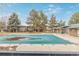 The community pool is covered for the winter with plenty of lounging space at 5928 S Willow Way, Greenwood Village, CO 80111