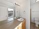 Bathroom with single vanity and updated fixtures at 9437 E 108Th Dr, Commerce City, CO 80640