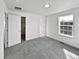 Bedroom with grey carpet, a closet, and an additional room at 9437 E 108Th Dr, Commerce City, CO 80640