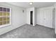 Well-lit bedroom featuring a closet and window at 9437 E 108Th Dr, Commerce City, CO 80640