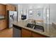 Kitchen with granite countertops and stainless steel appliances at 9437 E 108Th Dr, Commerce City, CO 80640