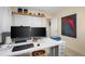 Bright office featuring a large workspace, monitors, and hardwood floors at 491 Campo St, Denver, CO 80221