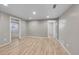 The finished basement area is a great bonus space and has stylish hard wood floors at 2518 S Ouray Way, Aurora, CO 80013