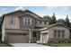 Charming two-story home with stone accents and a two-car garage at 1261 Morning Side Dr, Erie, CO 80516