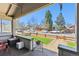 Cozy front porch view showcases the neighborhood and street at 1308 S Sherman St, Denver, CO 80210