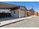 Detached two car garage with covered area adjacent to an alleyway at 1308 S Sherman St, Denver, CO 80210