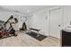 Home gym with Pro-Form treadmill, free weights and exercise bench at 1308 S Sherman St, Denver, CO 80210