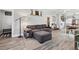 Open-concept living room featuring hardwood floors and neutral decor at 1308 S Sherman St, Denver, CO 80210