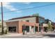 Corner building with brick and modern accents, showcasing its architectural design and street presence at 1308 S Sherman St, Denver, CO 80210