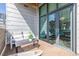 Charming balcony with a seating area and views of the city at 3100 Huron St # 2D, Denver, CO 80202