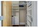 A reach-in closet with lots of shelves and drawers at 3100 Huron St # 2D, Denver, CO 80202