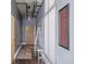 Modern hallway featuring hardwood floors, artwork, and stylish accents at 3100 Huron St # 2D, Denver, CO 80202