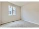 This bedroom features carpeted floors and a window providing natural light at 14390 Heritage Dr, Mead, CO 80504