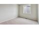Cozy room with a large window and soft carpet, ideal for relaxation and personalization at 14390 Heritage Dr, Mead, CO 80504