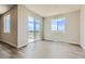 Bright dining room with slider to deck, and neutral walls and trim at 14390 Heritage Dr, Mead, CO 80504