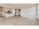 Open-concept living space combines kitchen and living area for seamless entertaining at 14390 Heritage Dr, Mead, CO 80504