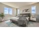 Comfortable bedroom with natural light, a cozy rug, and stylish decor for a relaxing space at 14390 Heritage Dr, Mead, CO 80504
