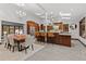 Spacious kitchen with stainless steel appliances, a large island, and a dining area at 1290 S Lininger Dr, Golden, CO 80401