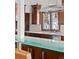 Kitchen featuring a glass countertop, stainless steel appliances, and natural light at 1290 S Lininger Dr, Golden, CO 80401