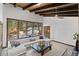 Inviting living room with large windows and natural light, comfortable seating, and wood accents at 1290 S Lininger Dr, Golden, CO 80401
