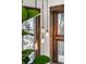 Modern pendant lights hang in front of a window with dark wood trim and bright daylight at 1290 S Lininger Dr, Golden, CO 80401