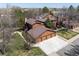 Aerial view of townhomes and garages with mature trees and landscaping at 6251 Willow Ln, Boulder, CO 80301