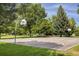 Basketball court offers a great space to play with hoops on either side of a well-maintained and expansive playing surface at 6251 Willow Ln, Boulder, CO 80301