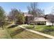 A view of a well maintained home with a sidewalk leading to the front door at 6251 Willow Ln, Boulder, CO 80301